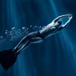 5 Increíbles Beneficios de Nadar con Aletas y Manoplas para Potenciar tu Entrenamiento Acuático